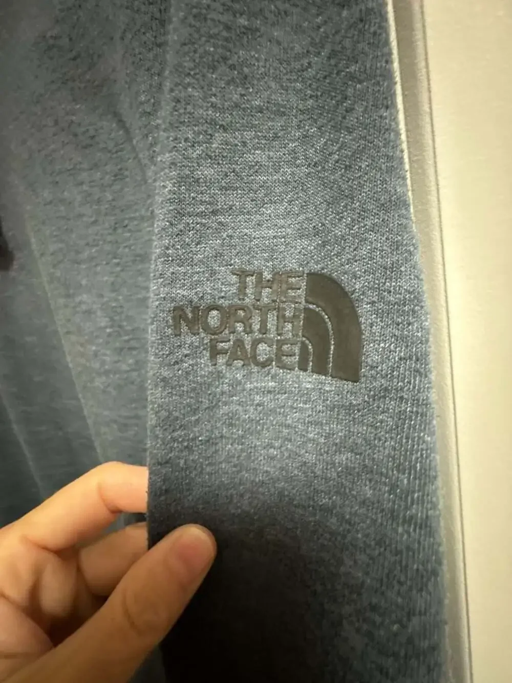 The North Face Men's Blue Heather Pullover Hoodie with Swag Logo Detail